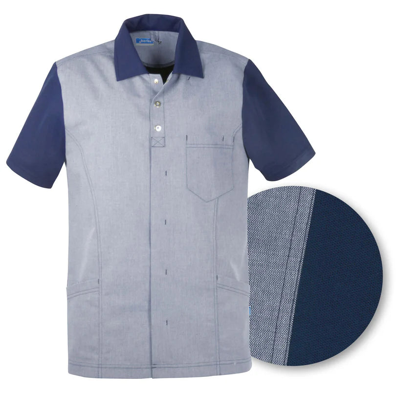 De Berkel FELIX Unisex jack, marineblauw met korte mouwen, voorzakken en borstzak, contrastkraag en knopenrij.
